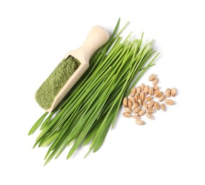 Photo of Wheat grass powder in scoop, seeds and fresh sprouts isolated on white, top view