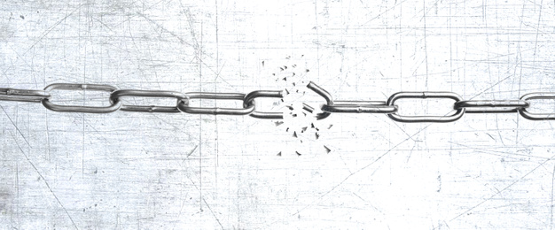 Image of Broken metal chain on light background. Freedom concept 