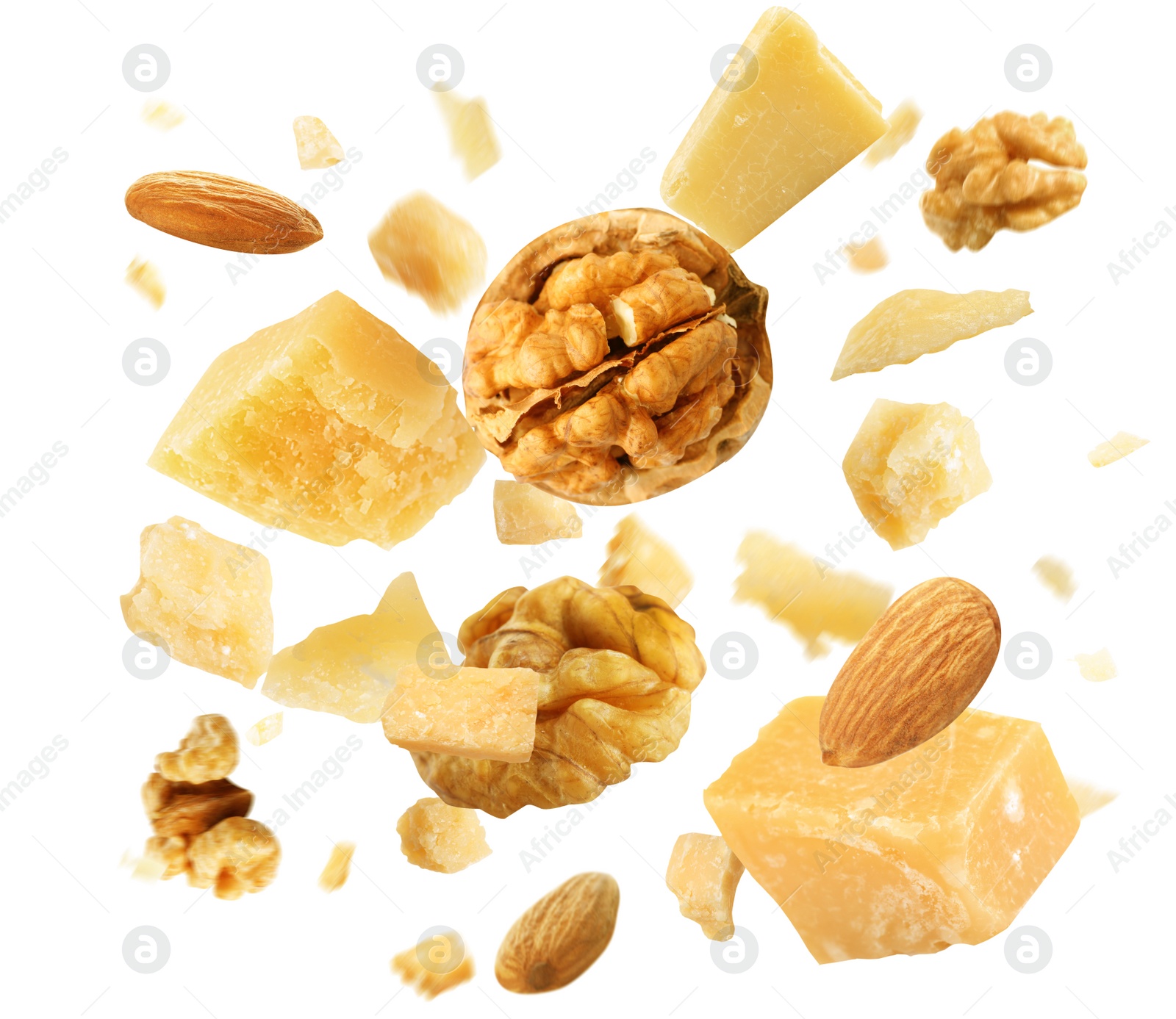 Image of Pieces of delicious parmesan and walnuts on white background