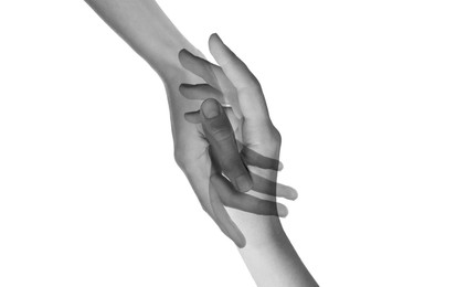 Double exposure of people's hands on white background, closeup. Black and white effect