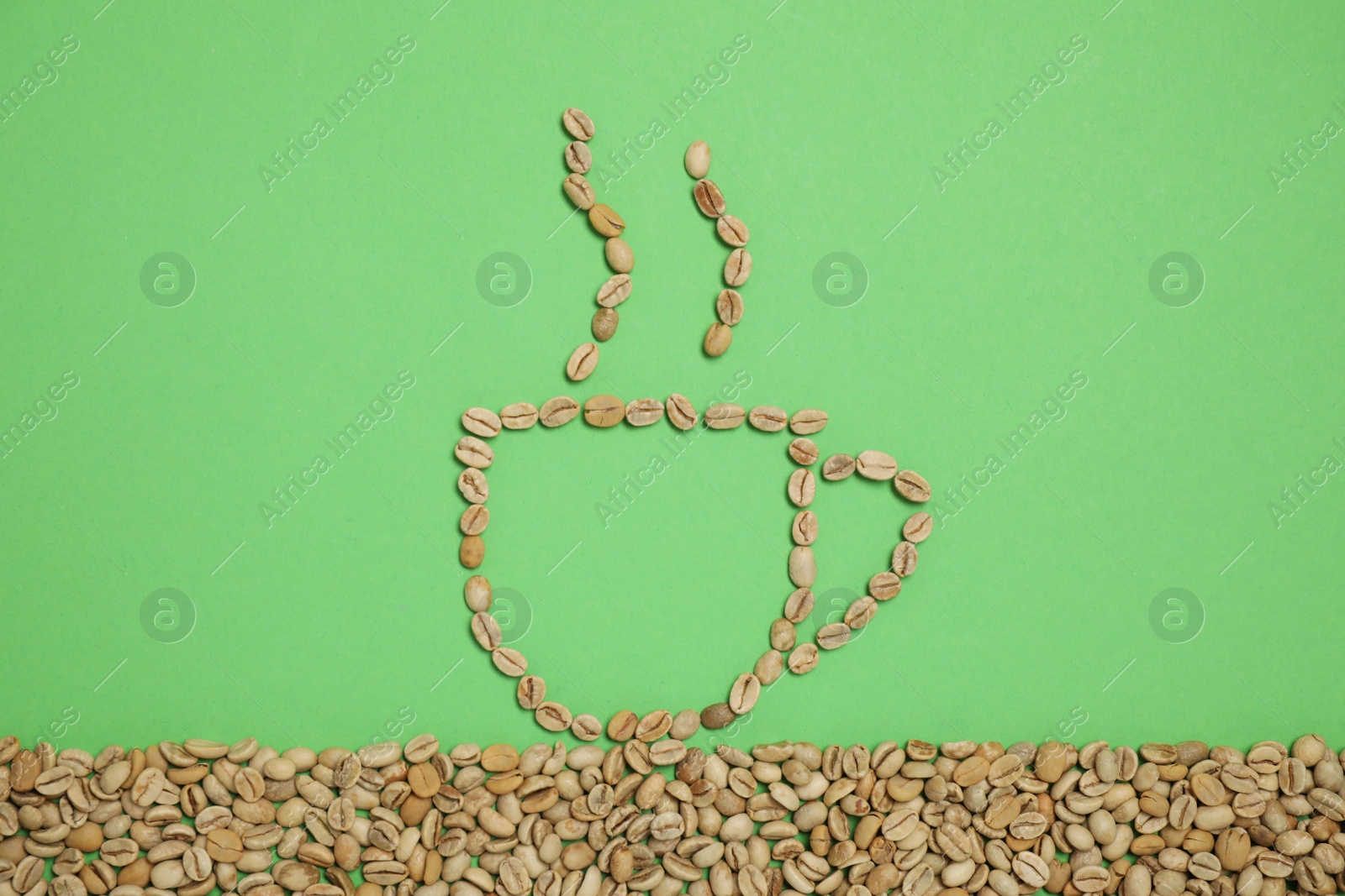 Photo of Cup of hot drink, composition made with coffee beans on green background, flat lay