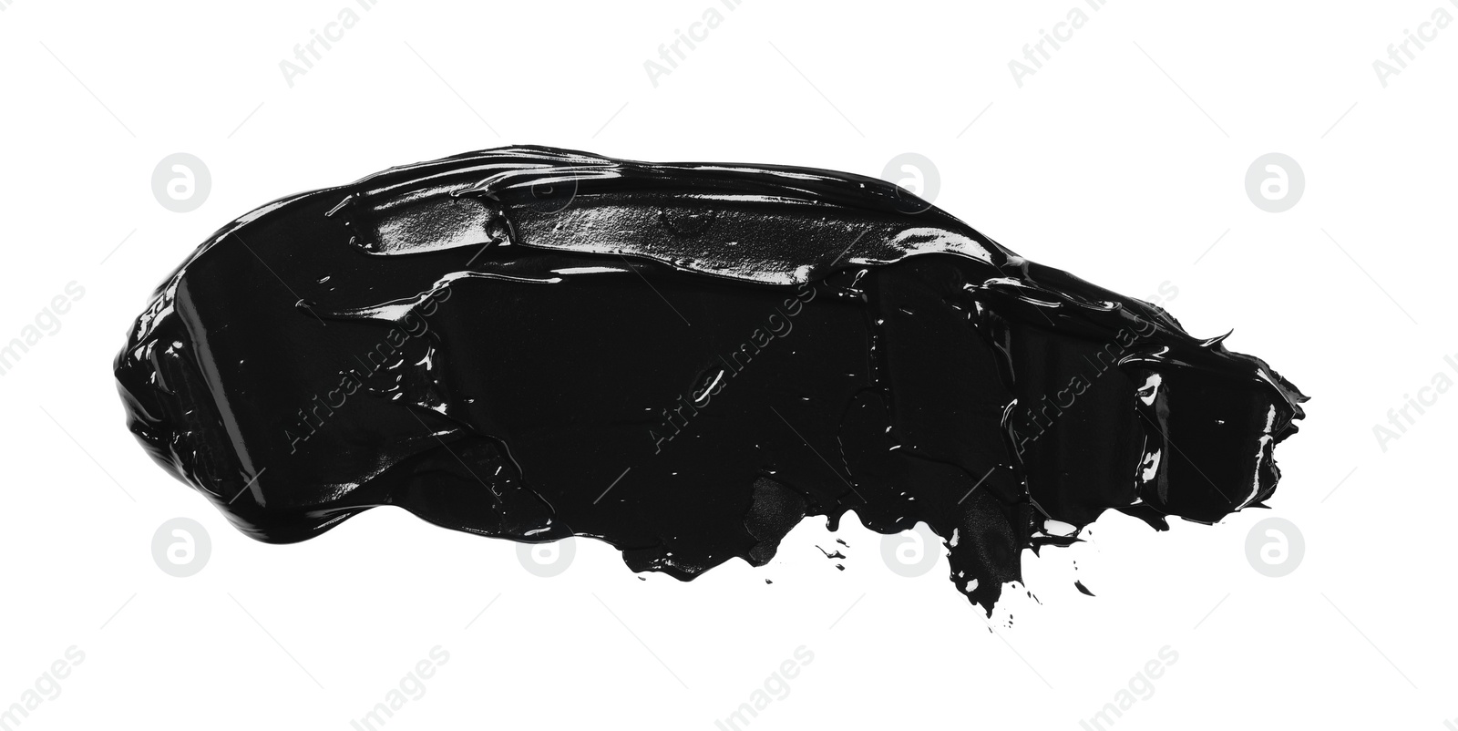 Photo of Smear of black glossy paint on white background, top view