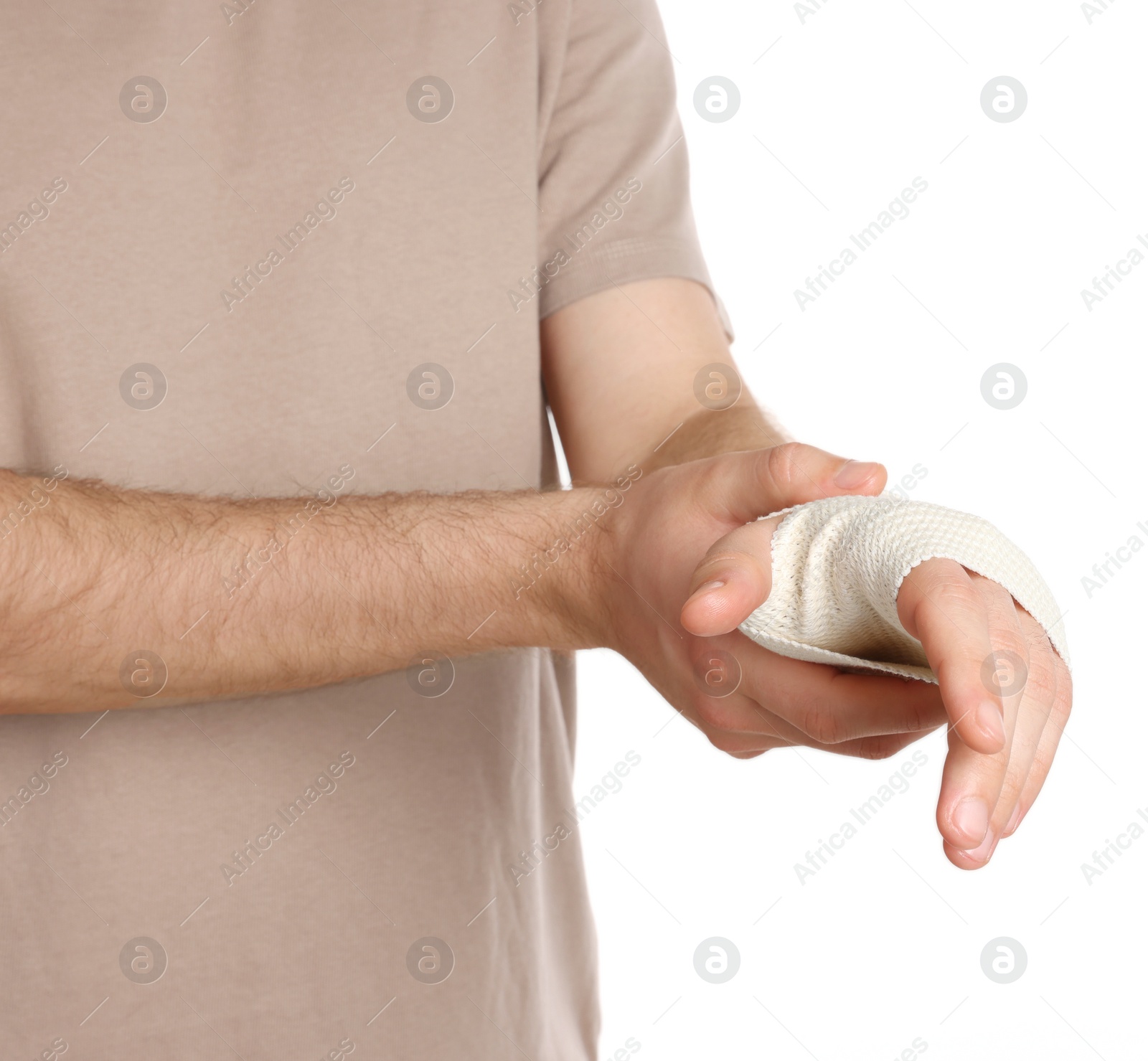 Photo of Man with hand wrapped in medical bandage on white background, closeup