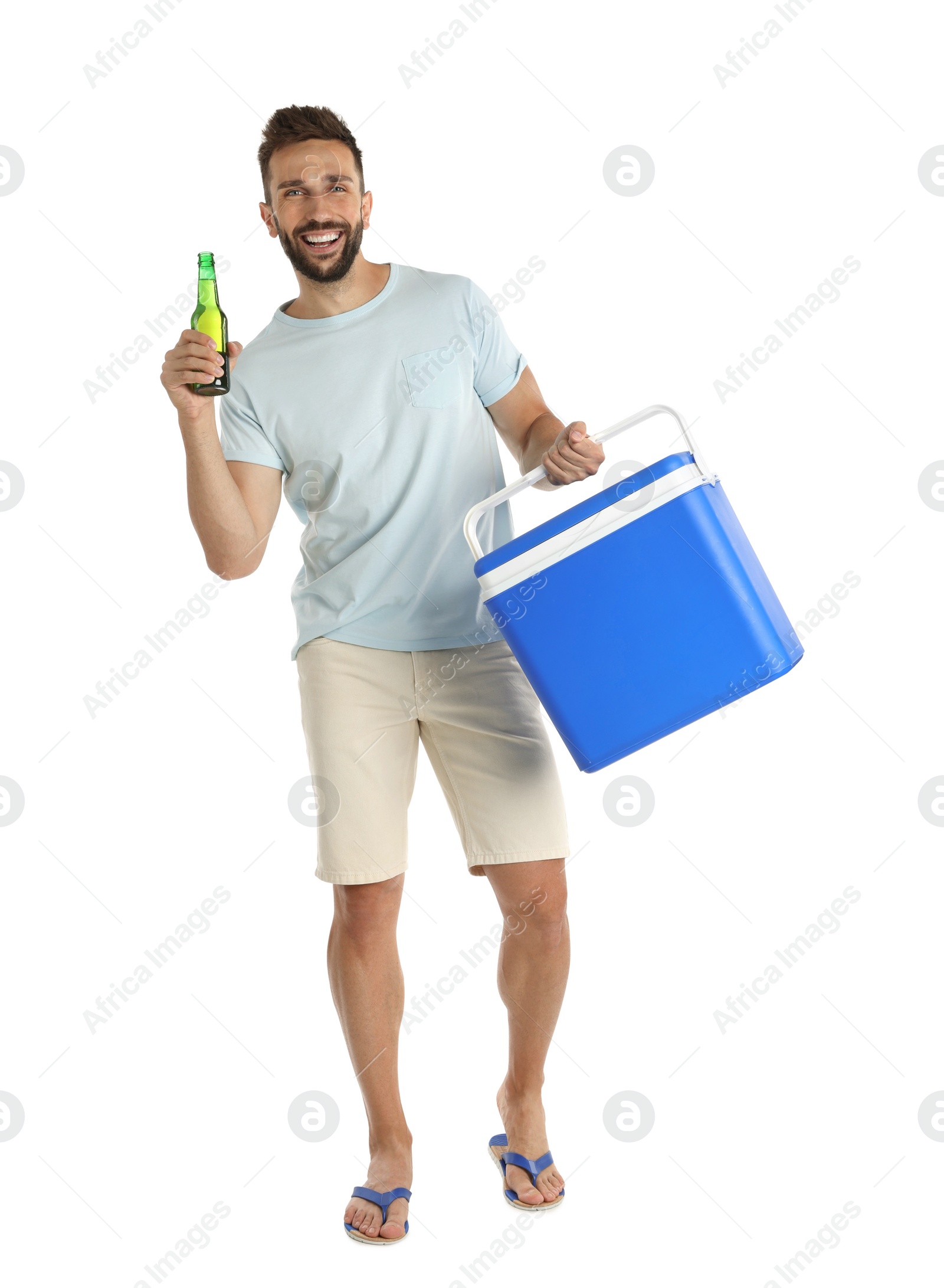 Photo of Happy man with cool box and bottle of beer on white background