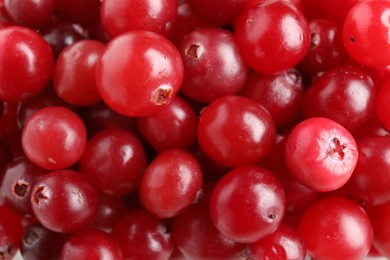 Photo of Red ripe cranberries as background, top view