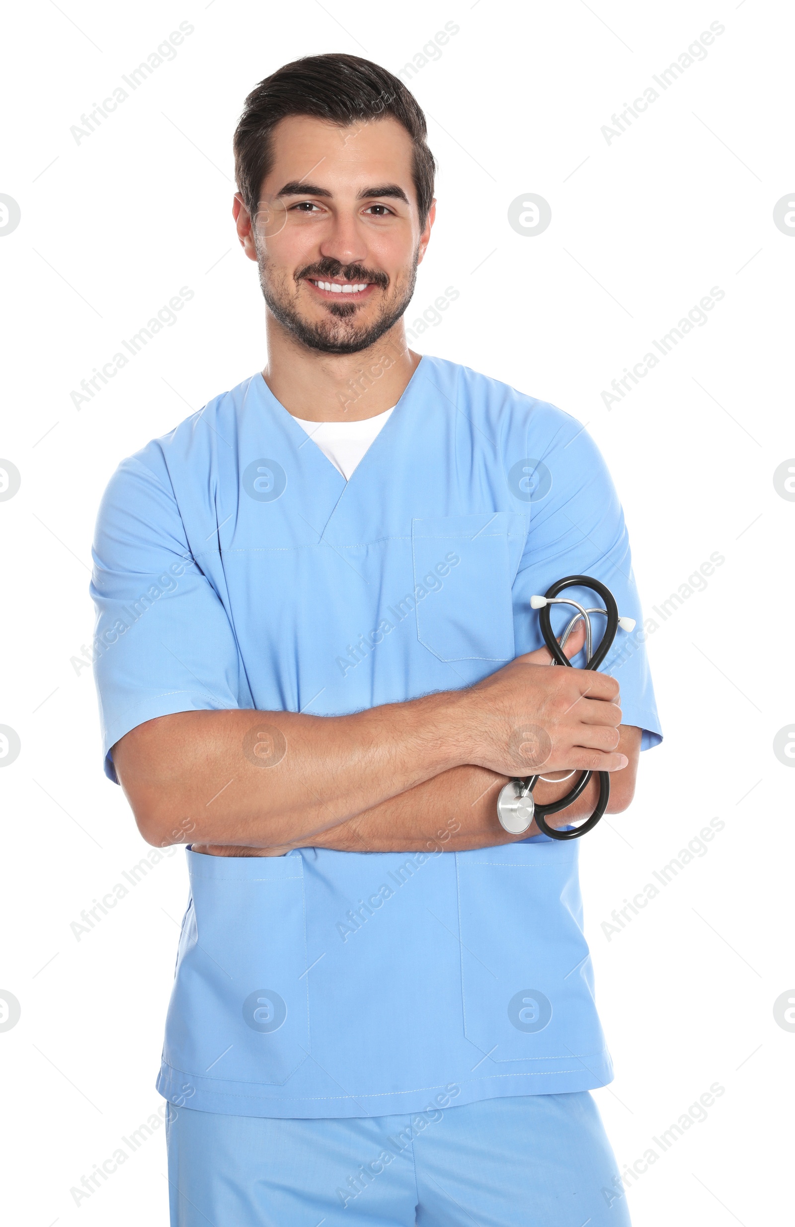 Photo of Young male doctor in uniform with stethoscope on white background. Medical service