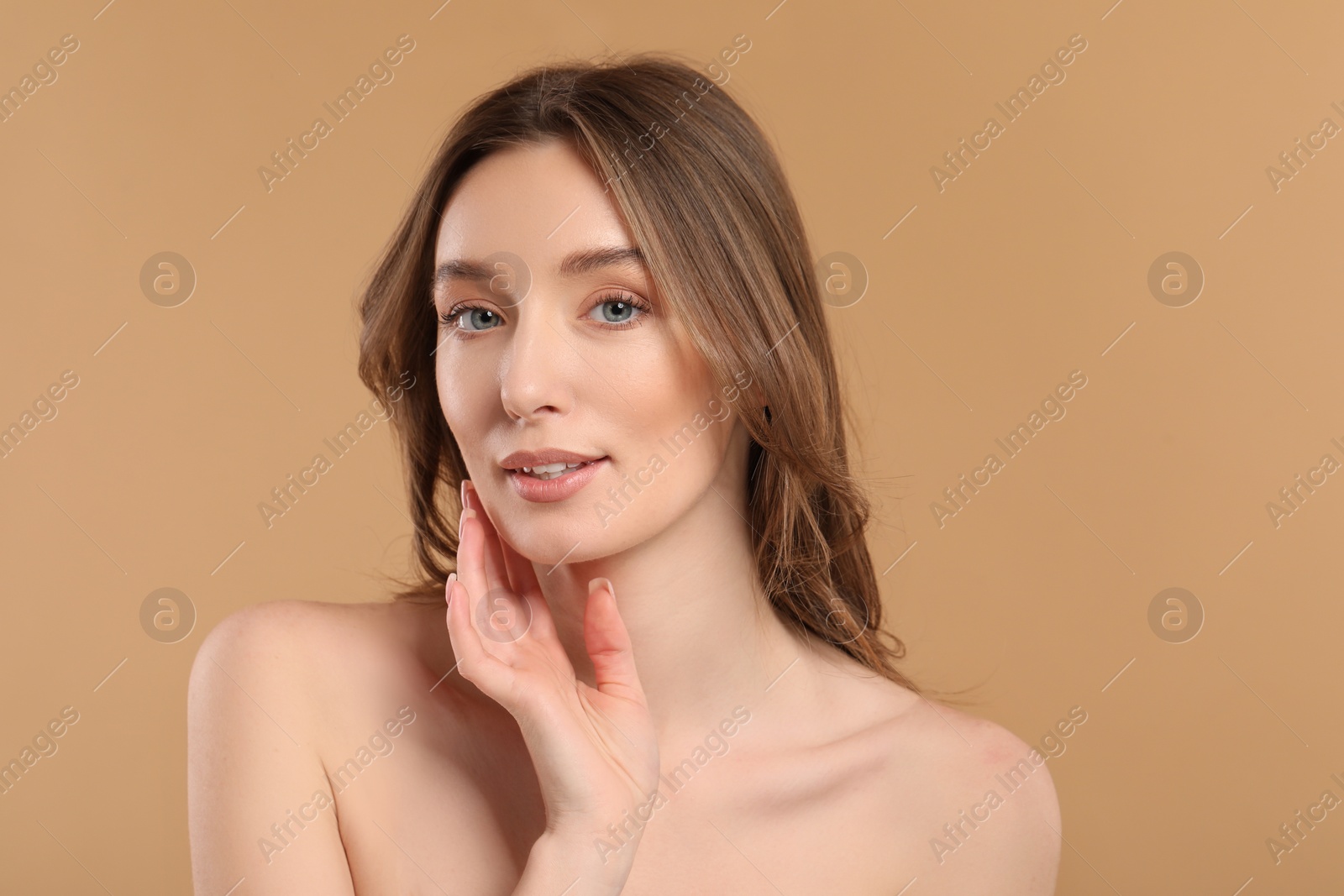 Photo of Beautiful woman with healthy skin on beige background, space for text