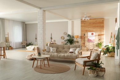 Photo of Spacious apartment interior with stylish wooden furniture. Idea for design
