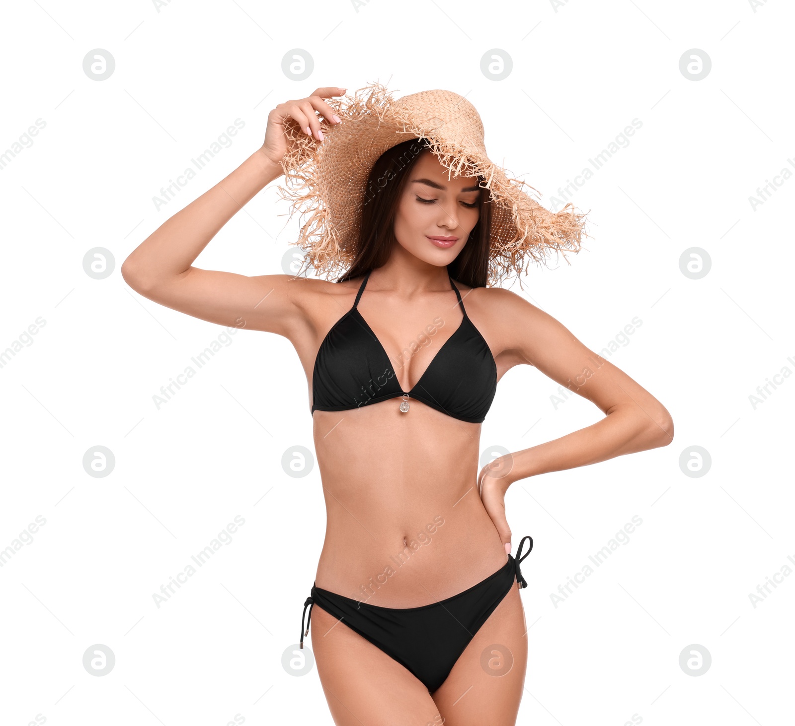 Photo of Young woman in stylish bikini and straw hat isolated on white