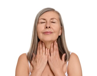 Beautiful woman touching her neck on white background