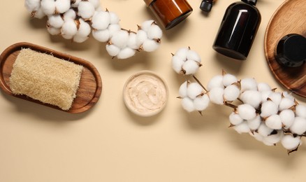 Bath accessories. Flat lay composition with personal care products on beige background, space for text