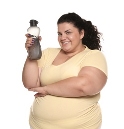 Photo of Overweight woman with bottle of water on white background