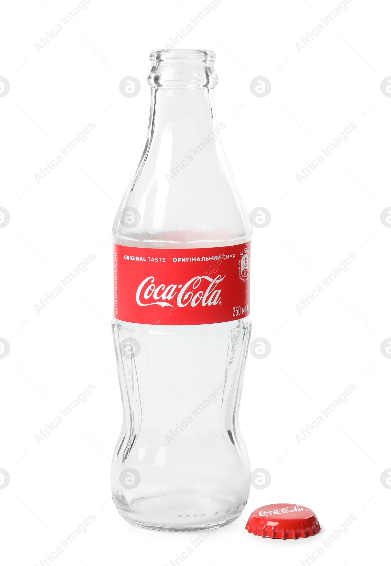 Photo of MYKOLAIV, UKRAINE - NOVEMBER 15, 2018: Coca Cola bottle and lid on white background