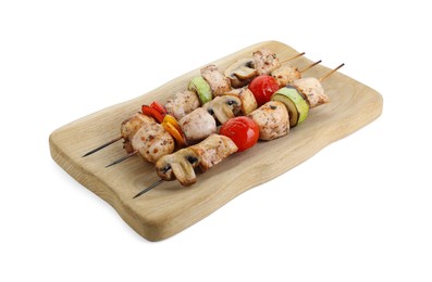 Photo of Wooden board with delicious shish kebabs and grilled vegetables isolated on white