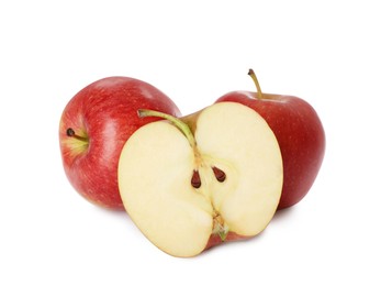 Photo of Whole and cut apples on white background