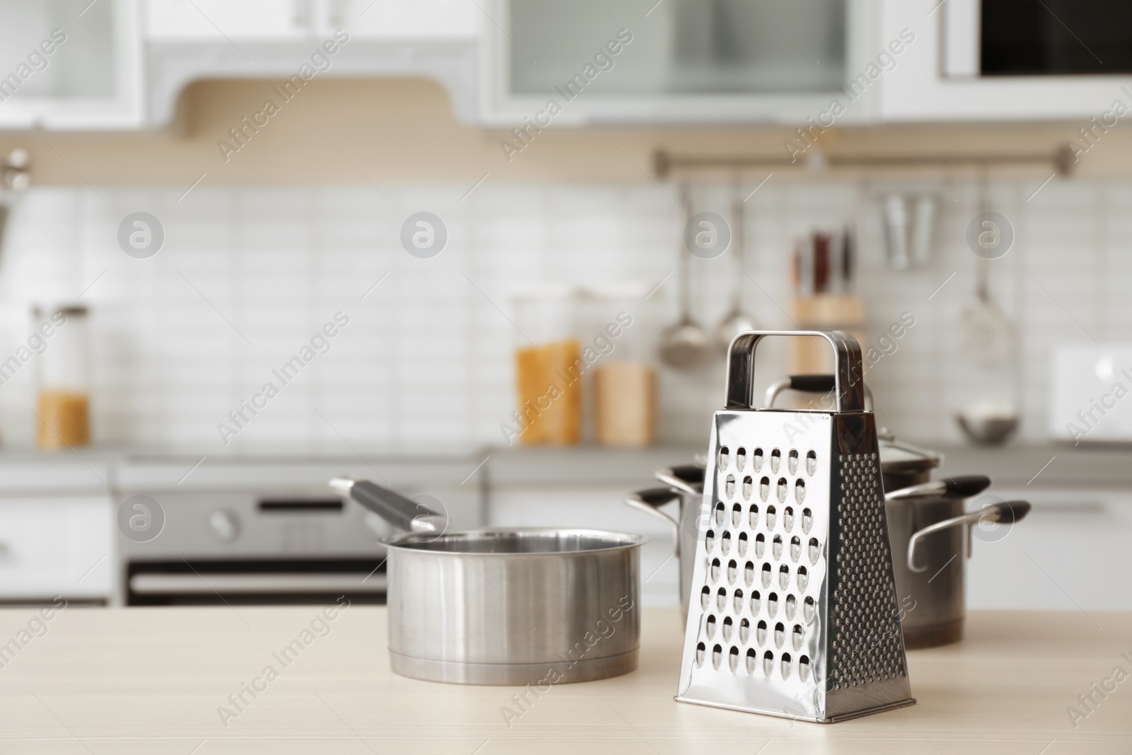 Photo of Houseware and blurred view of kitchen interior on background