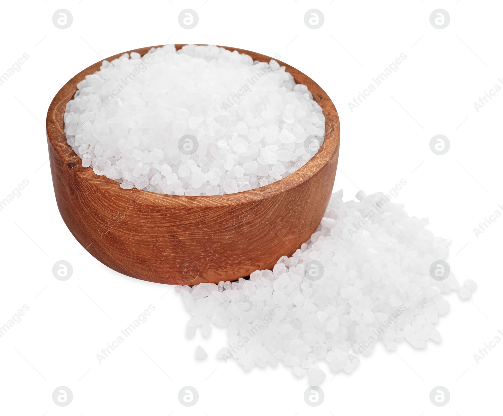 Photo of Wooden bowl and heap of natural sea salt isolated on white