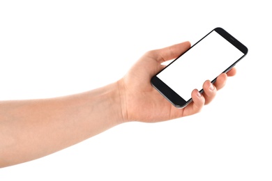 Photo of Man holding smartphone with blank screen on white background, closeup of hand. Space for text