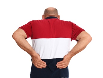 Mature man suffering from backache on white background