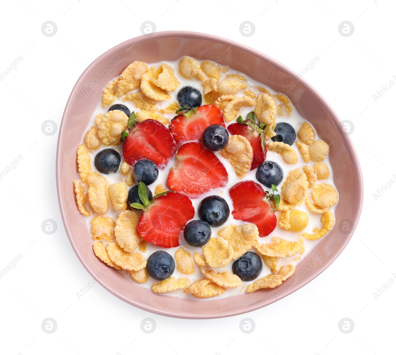 Photo of Bowl of tasty crispy corn flakes with milk and berries isolated on white, top view
