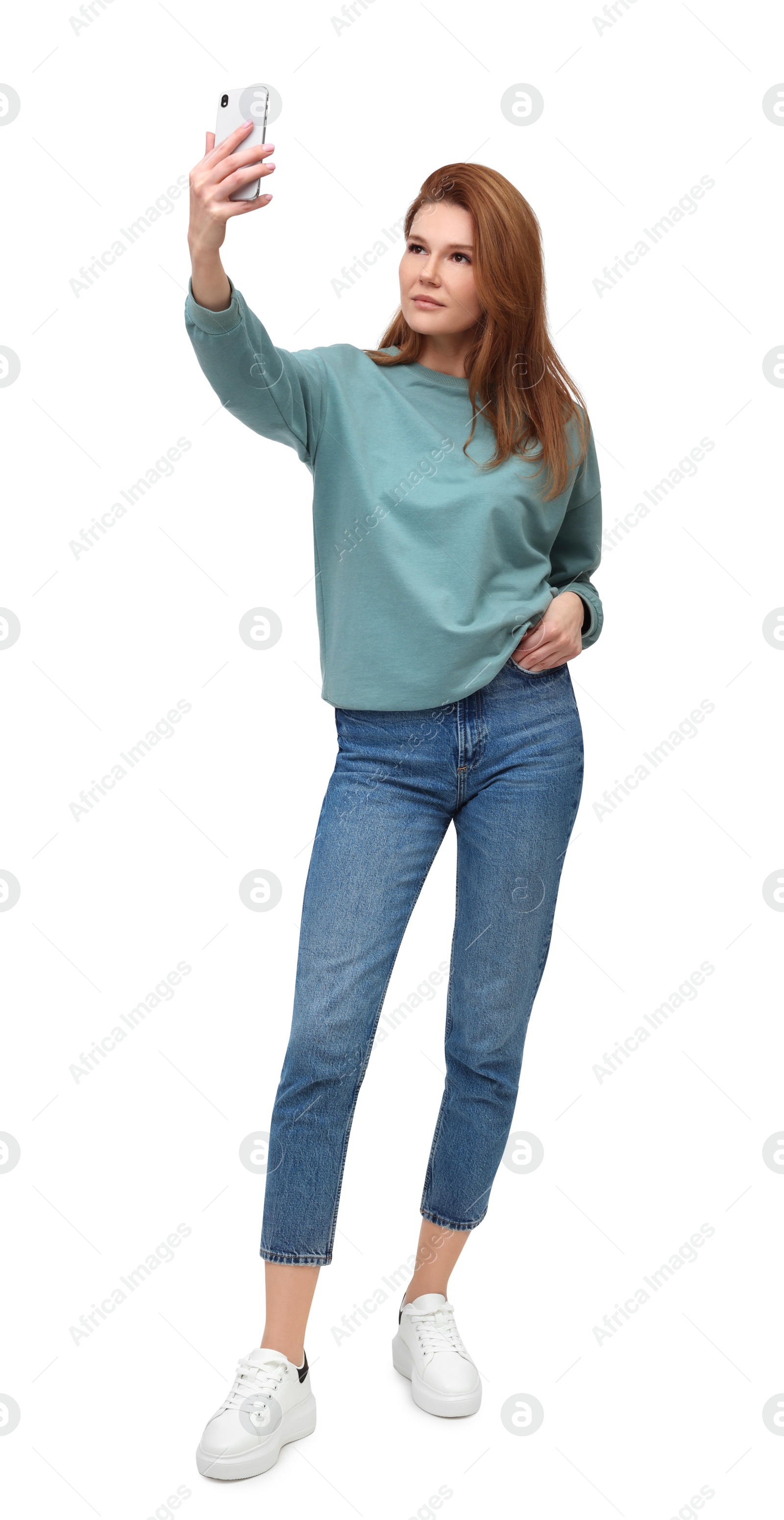 Photo of Beautiful woman taking selfie on white background