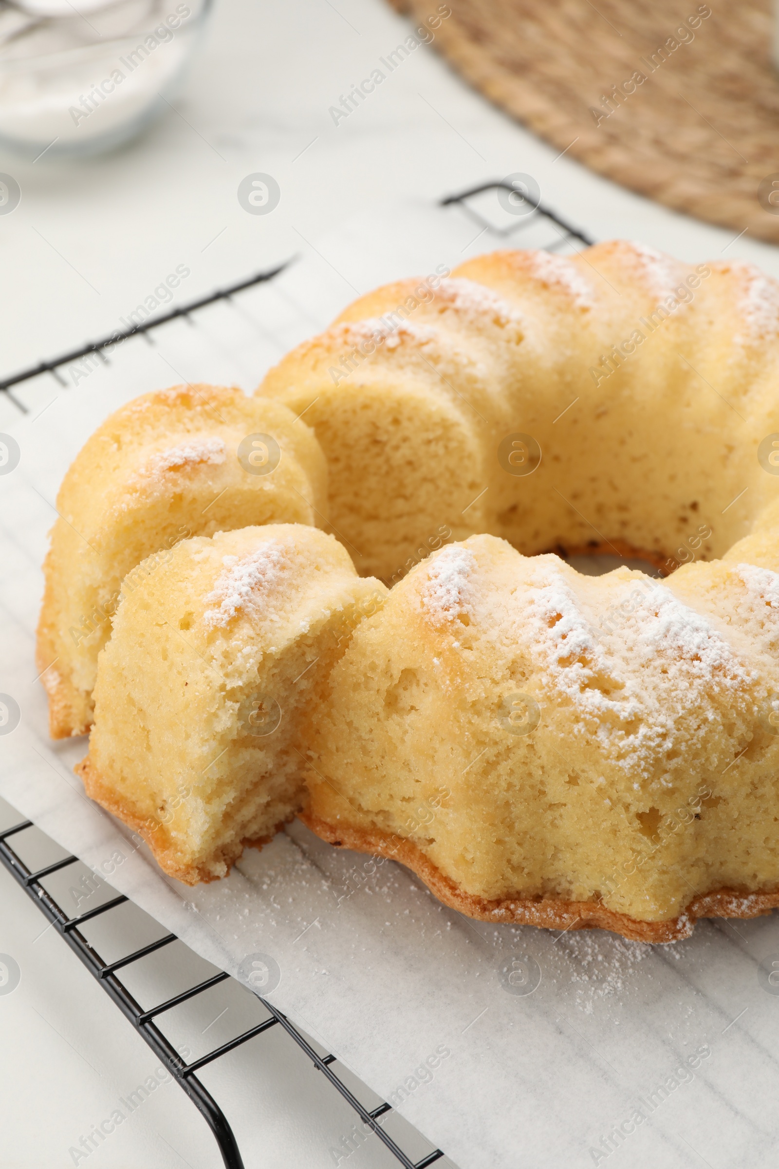 Photo of Delicious freshly baked sponge cake on table, closeup