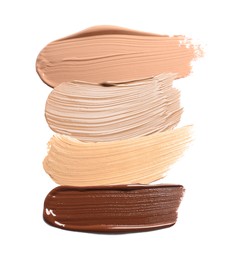 Image of Foundation of various shades for different skin tones isolated on white, top view. Set of samples