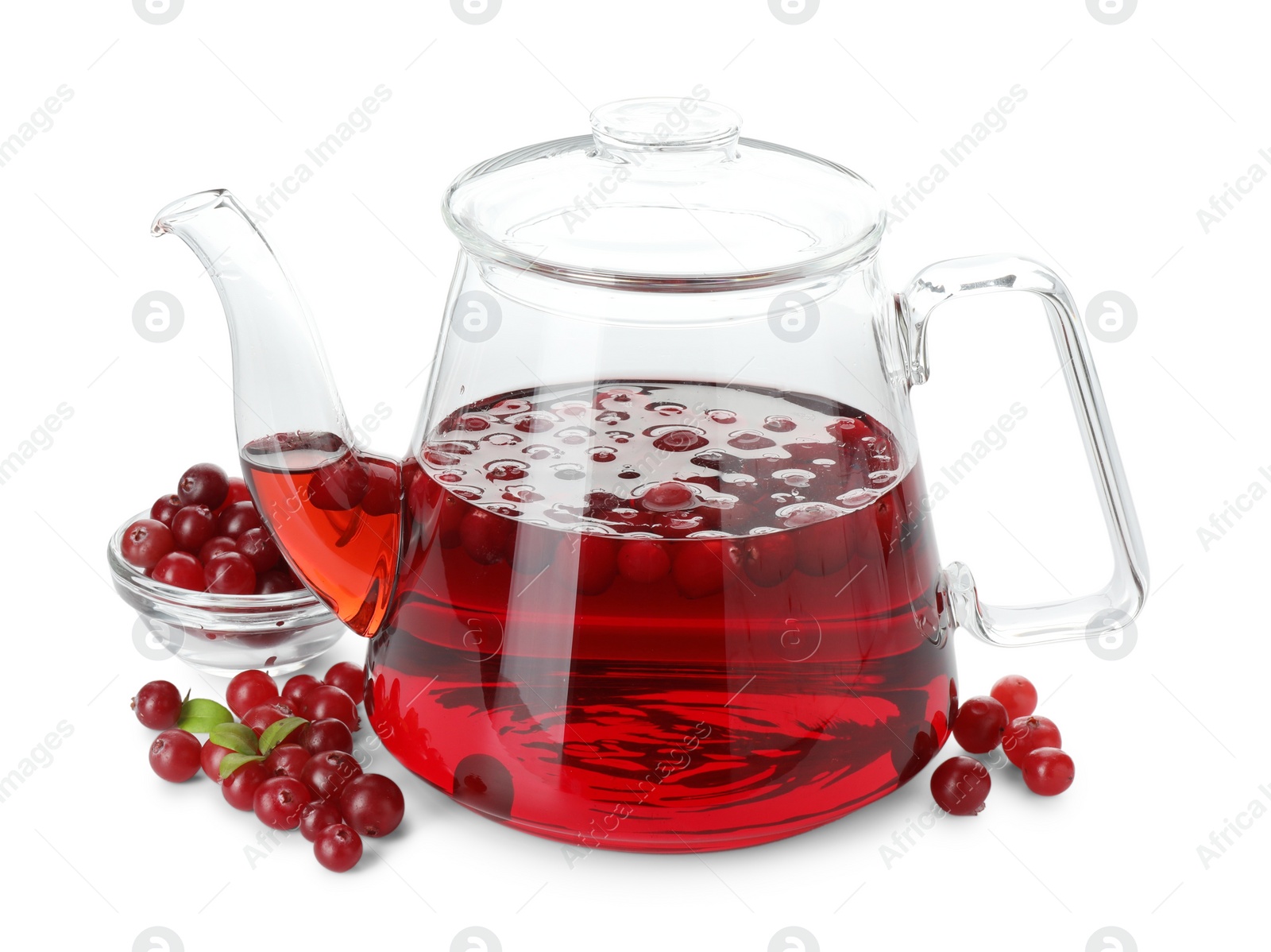 Photo of Teapot with delicious cranberry tea and berries isolated on white