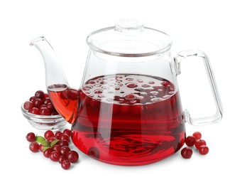 Photo of Teapot with delicious cranberry tea and berries isolated on white