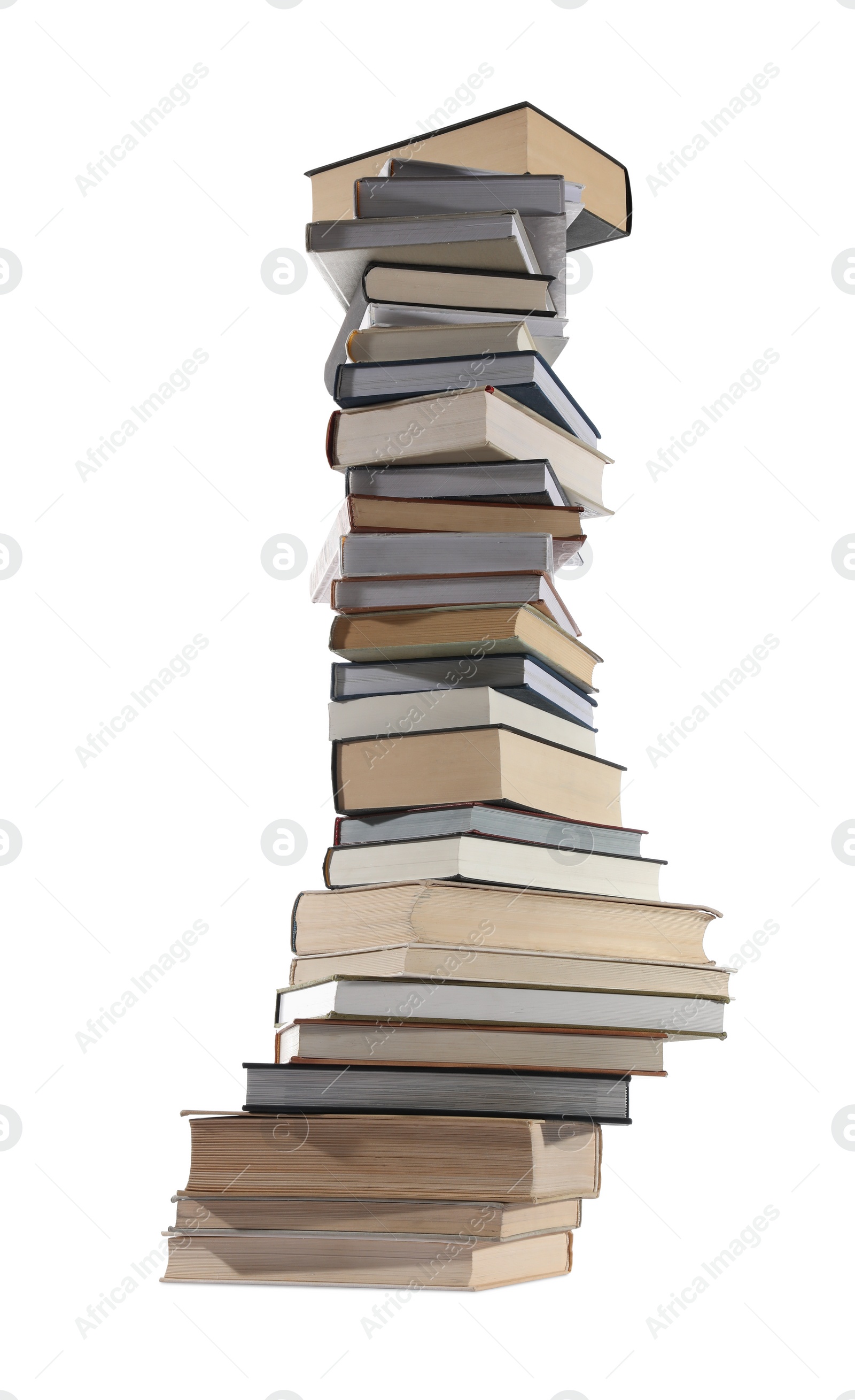 Photo of High stack of many different books isolated on white