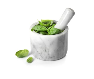 Mortar with fresh green basil leaves on white background