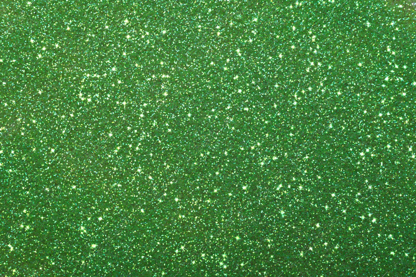 Image of Beautiful shiny green glitter as background, closeup