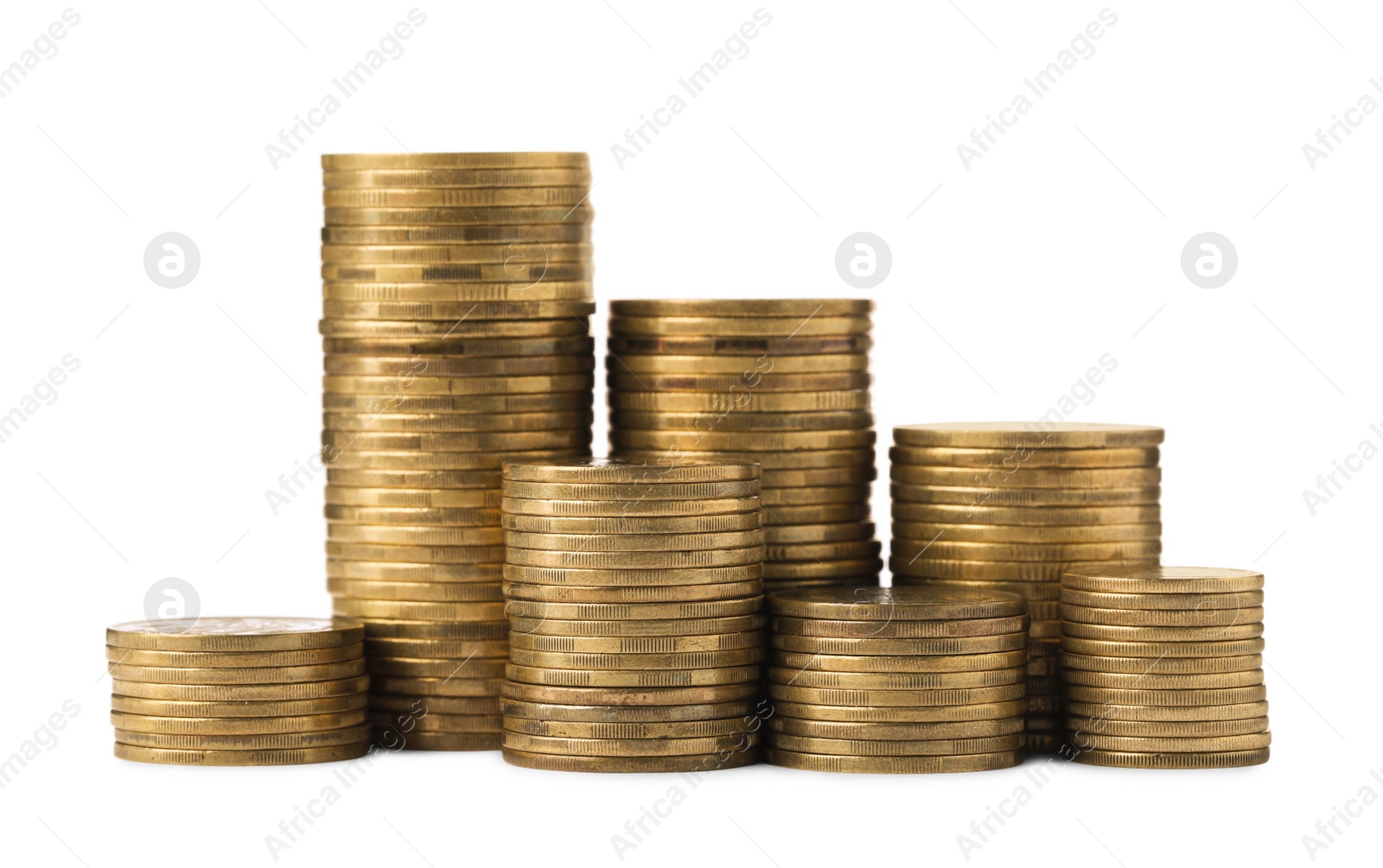 Photo of Many golden coins stacked on white background