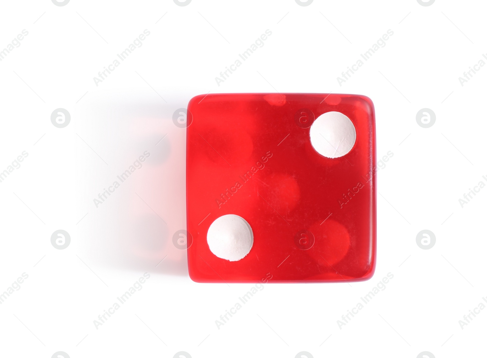 Photo of One red game dice isolated on white, top view