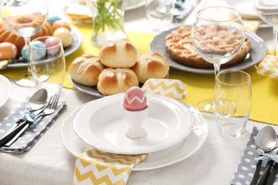 Photo of Festive Easter table setting with traditional meal