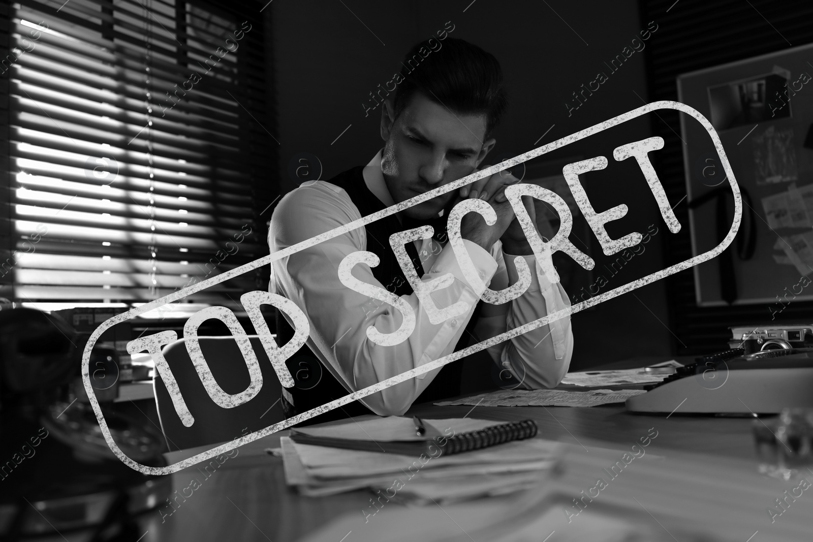 Image of Classified information of investigation. Old fashioned detective working at table in office, black and white effect. Stamp Top Secret