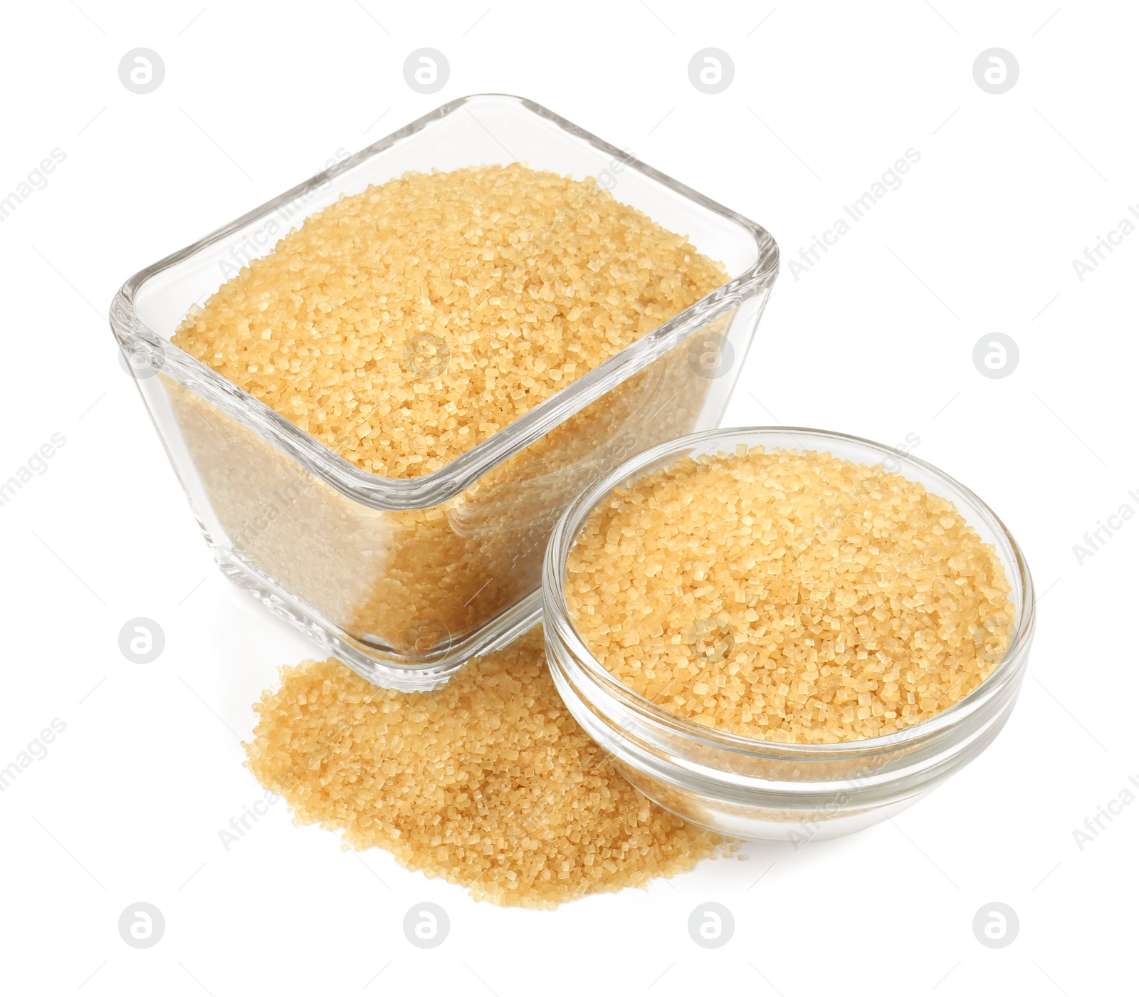 Photo of Brown sugar in glass bowls isolated on white