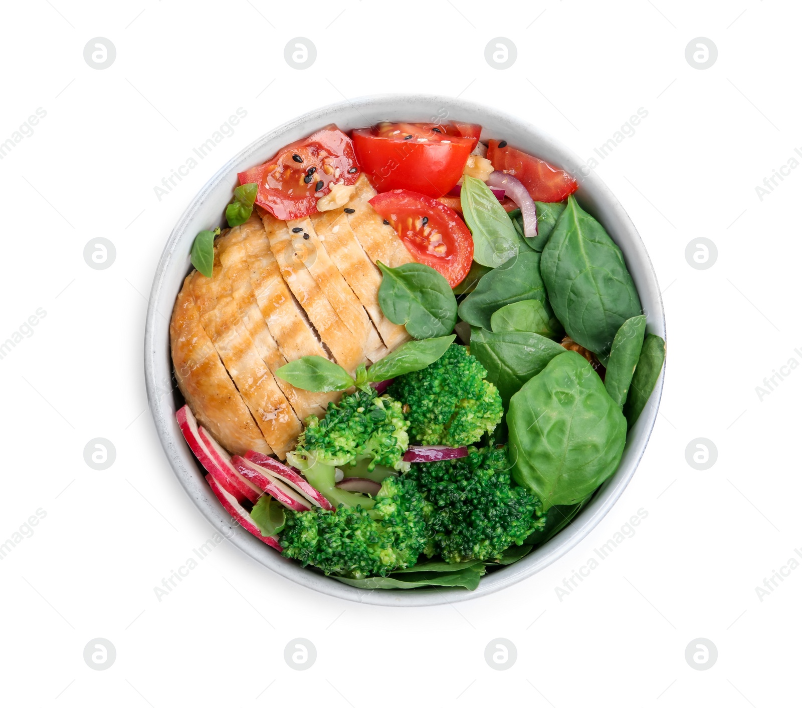 Photo of Healthy meal. Delicious chicken, vegetables and spinach in bowl isolated on white, top view