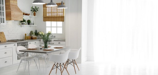 Image of Beautiful kitchen interior with new stylish furniture, space for text. Banner design