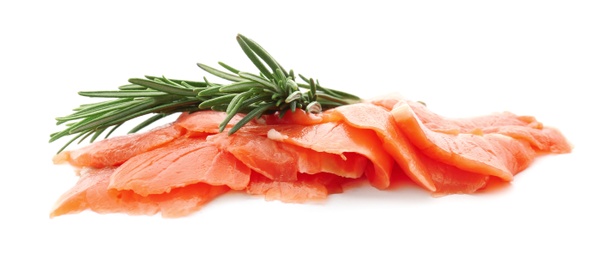 Photo of Fresh sliced salmon fillet with rosemary on white background