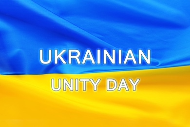Image of Text Ukrainian Unity Day and national flag on background