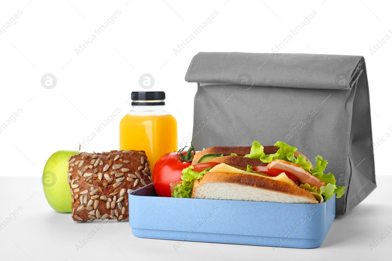 Photo of Lunch box with healthy food for schoolchild on white background