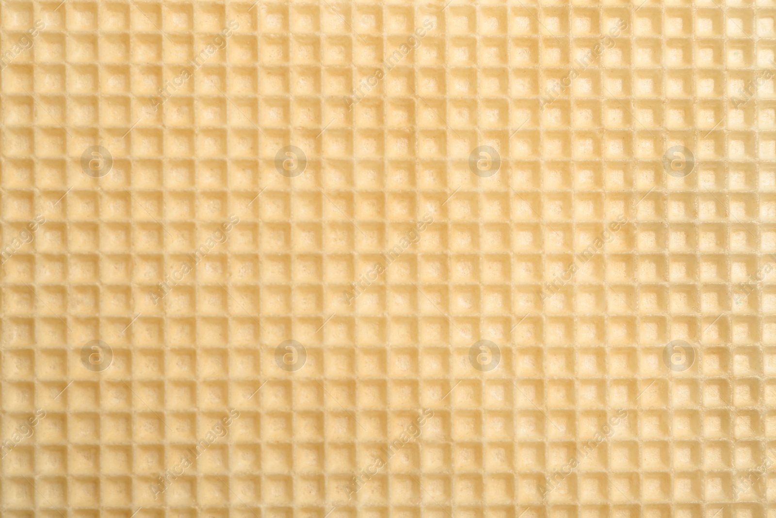 Photo of Tasty wafer as background, closeup. Crispy food