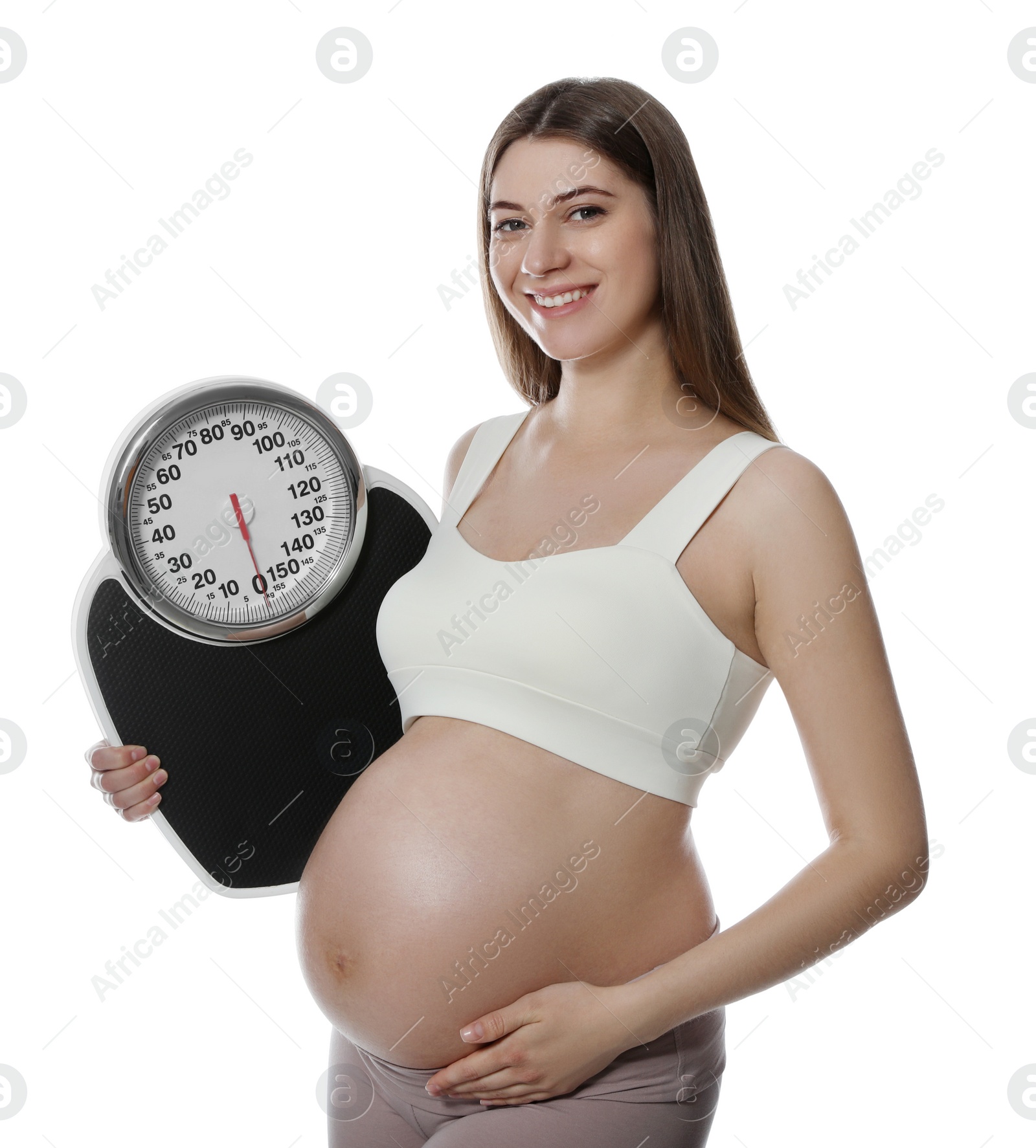 Photo of Pregnant woman with scales on white background