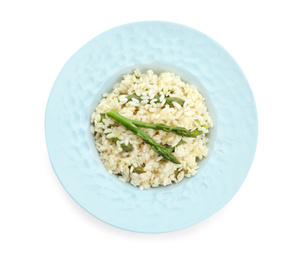 Photo of Delicious risotto with asparagus isolated on white, top view