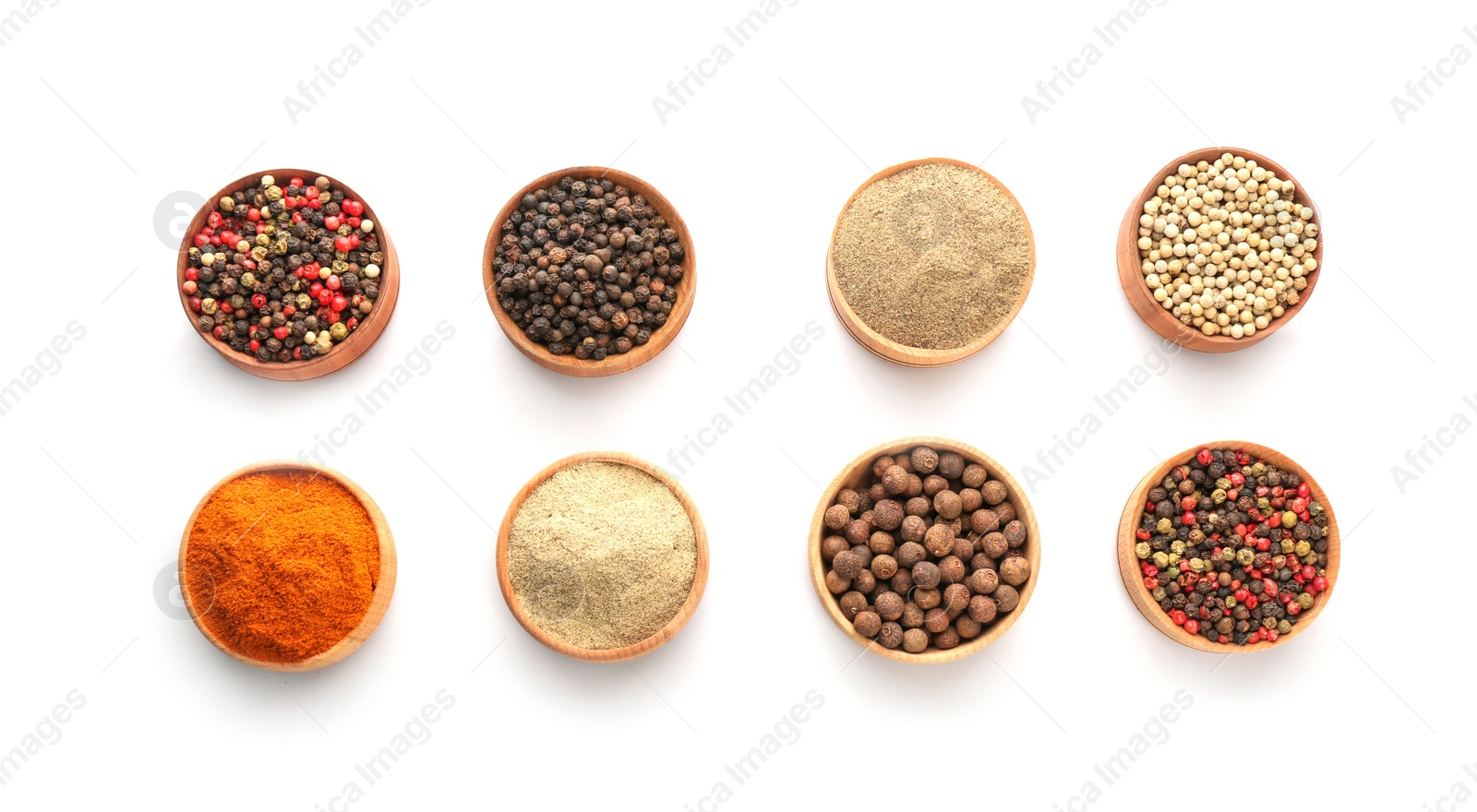 Photo of Bowls with different types of pepper on white background, top view