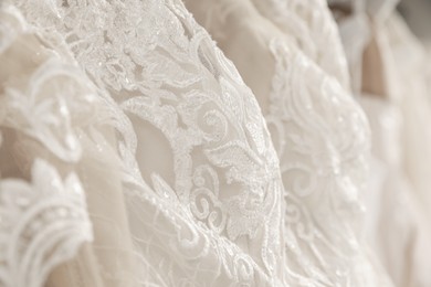 Photo of Beautiful wedding dress with lace, closeup view