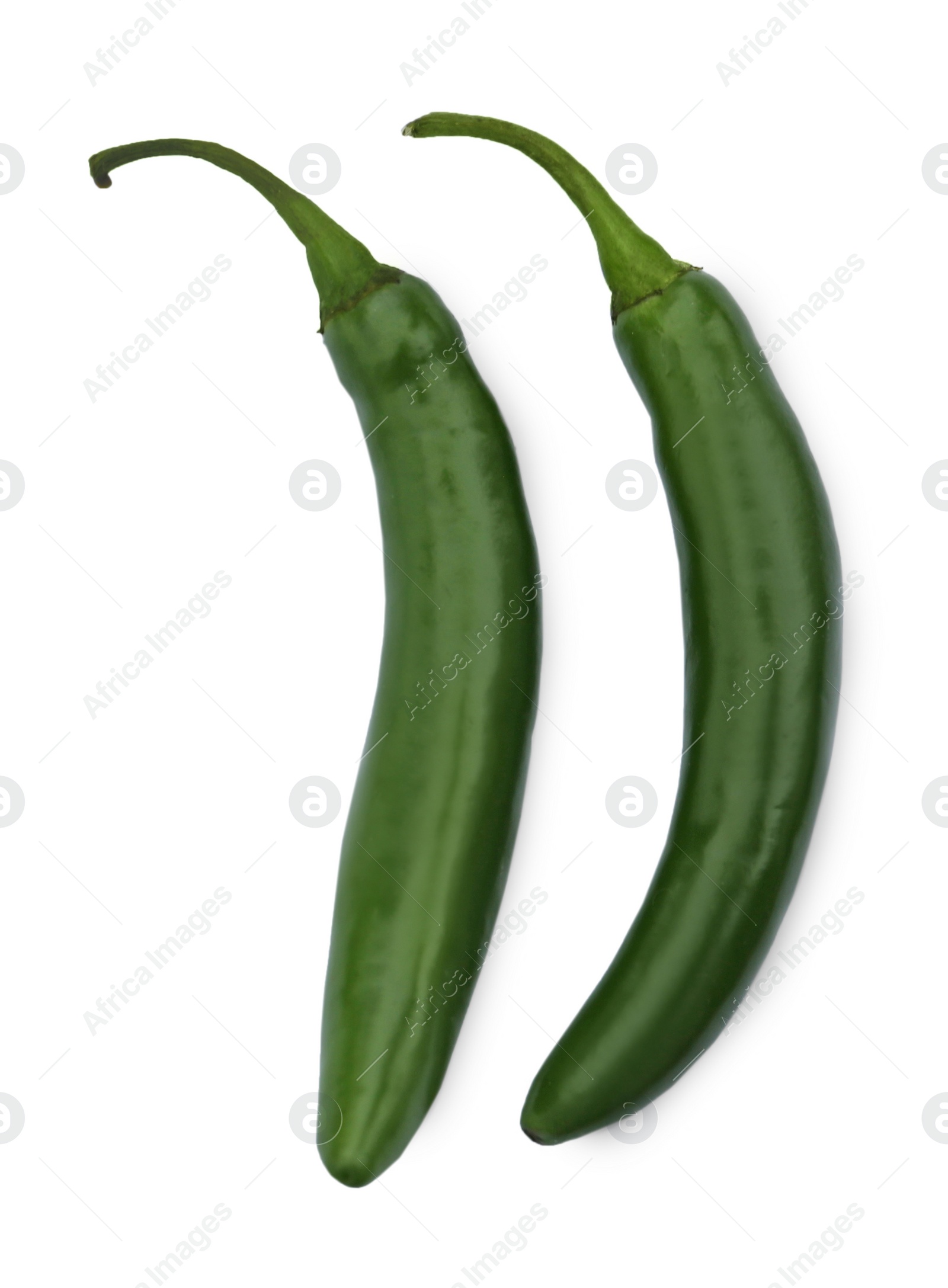 Photo of Green hot chili peppers on white background, top view