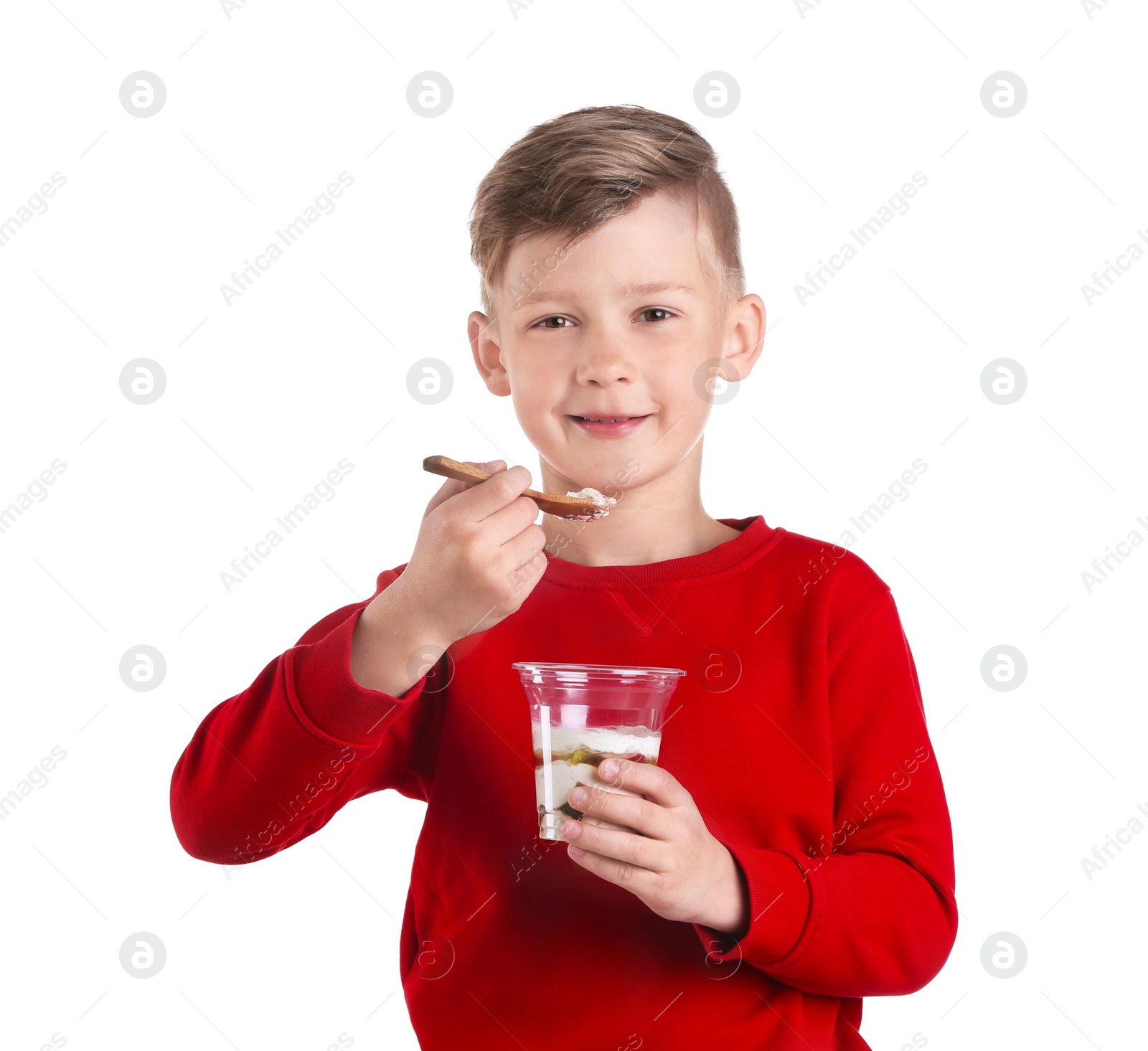 Photo of Little boy with yogurt on white background