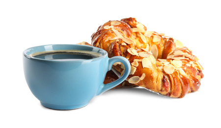 Delicious pastries and coffee on white background